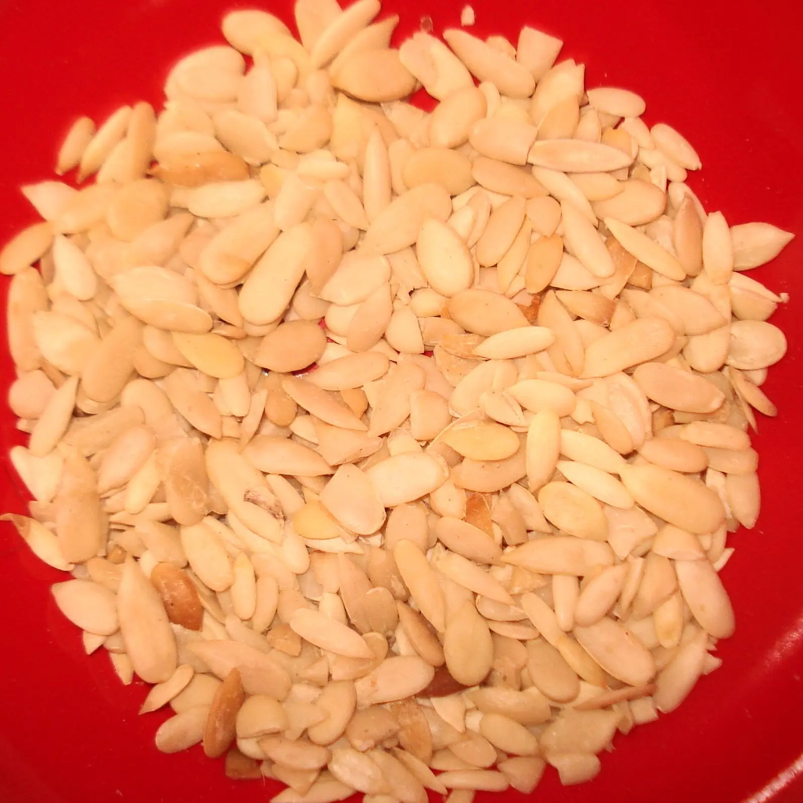 Peeled vellari seed kernels in a bowl